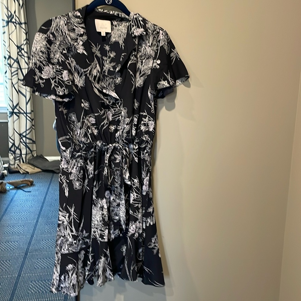 Light weight silk dress with built in tie and ruffle on bottom